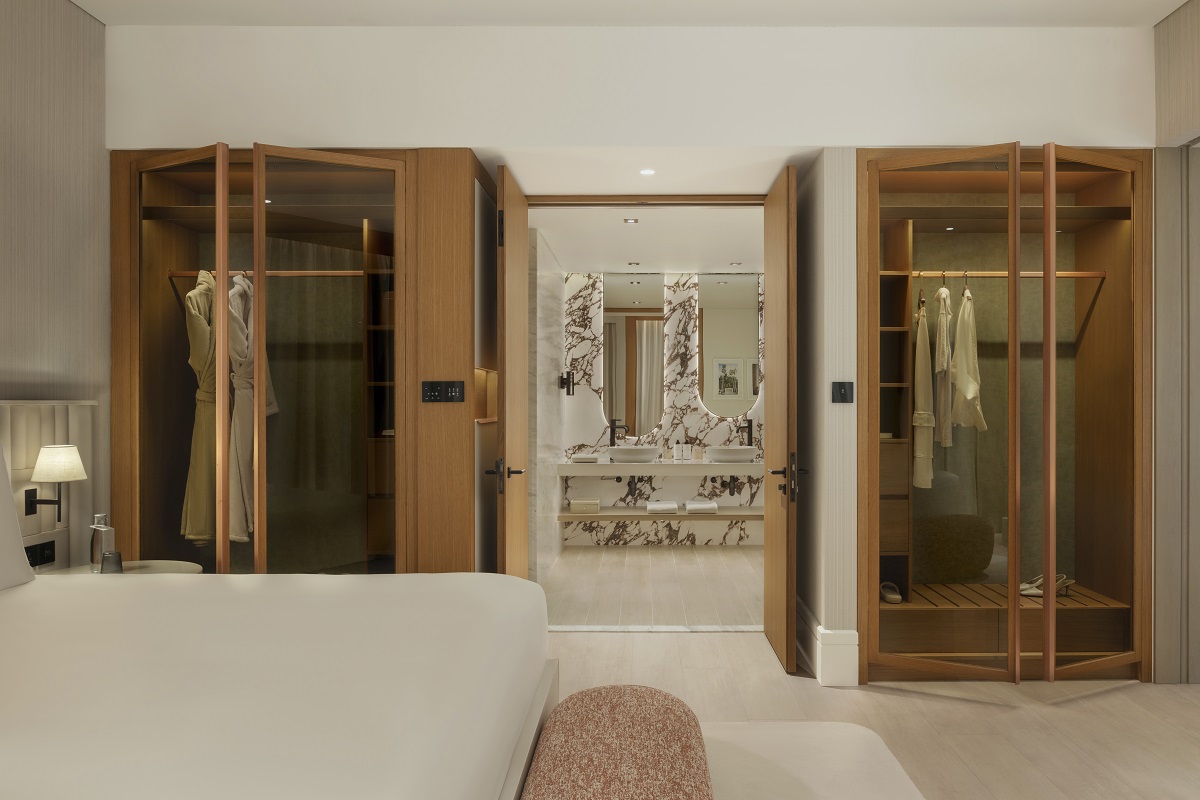 view from bedroom into marble bathroom