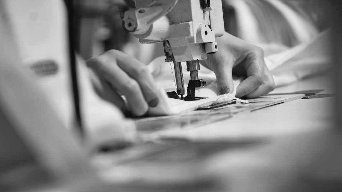 close up of hands working on production in Silentnight factory