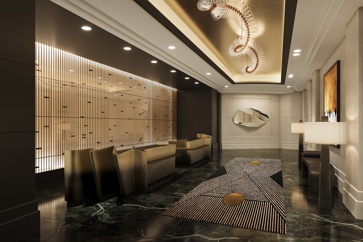 swirled lighting feature in front of gold reception desk