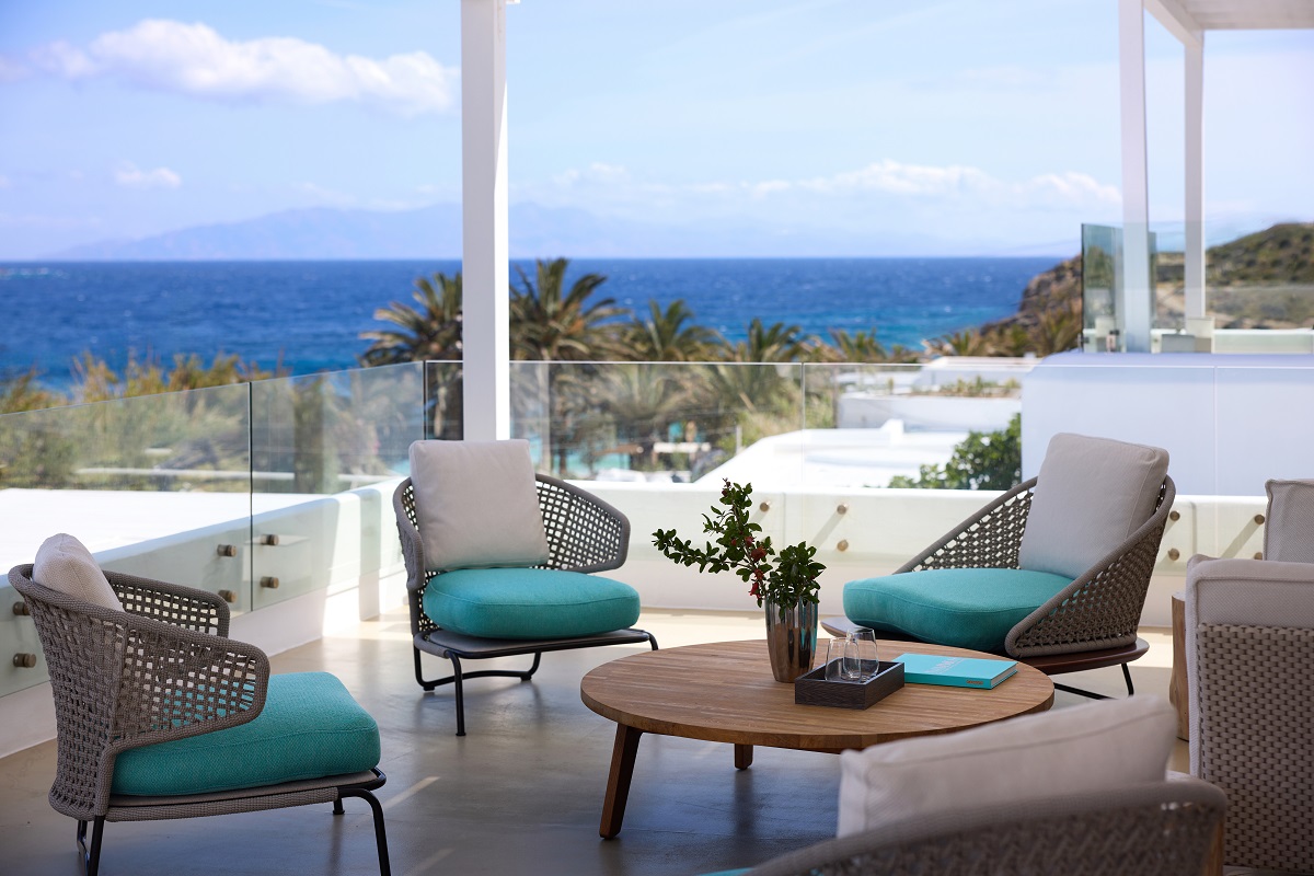 turquoise, white and wood on terrace at mykonos villa