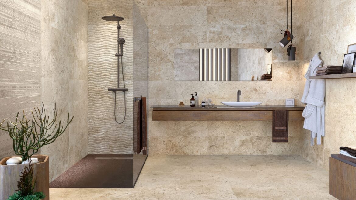 bathroom with natural stone colours and textures in large format tiles on floor and walls from Hyperion Tiles