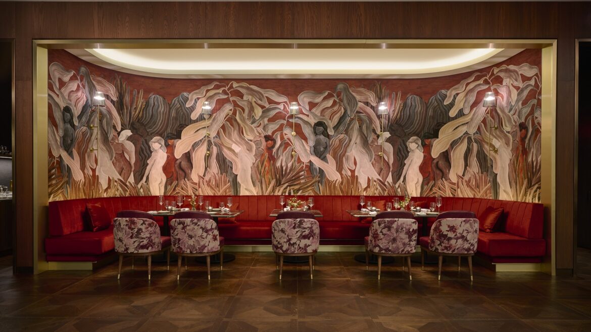 Arte wallcovering in statement wall behind banquette seating in hilton lobby