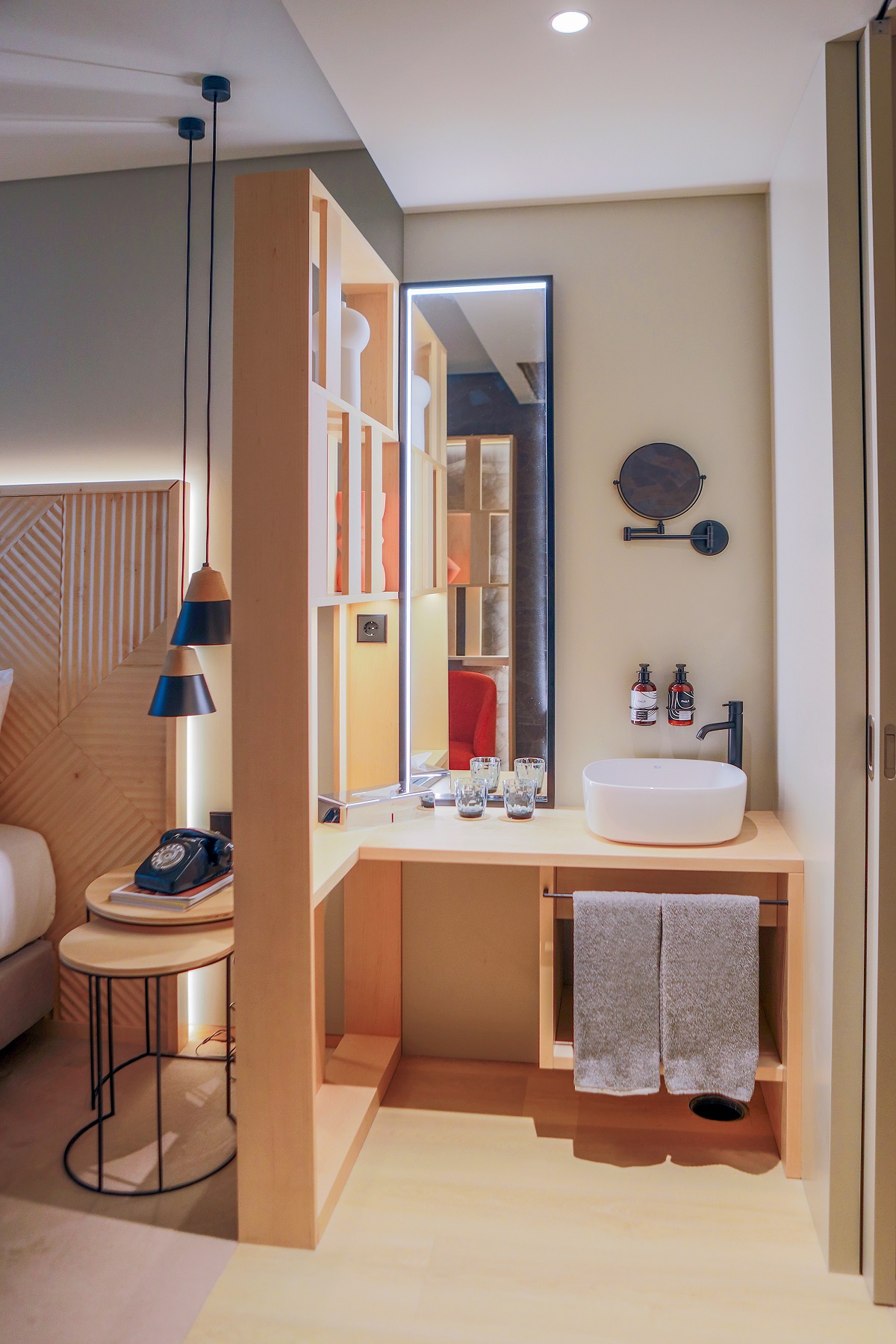 guestroom view of bed and ensuite bathroom