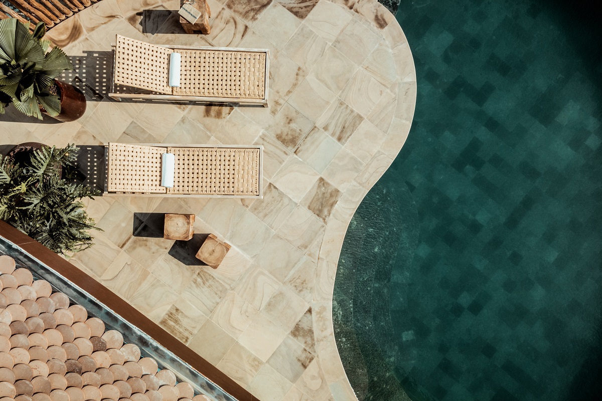 view from above of curved edge of saltwater swimming pool 