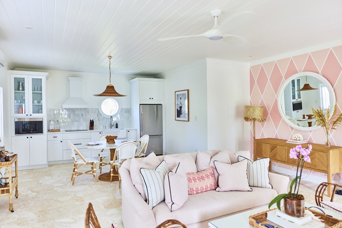 white and coral interior in the guest rooms at The Potlatch Club