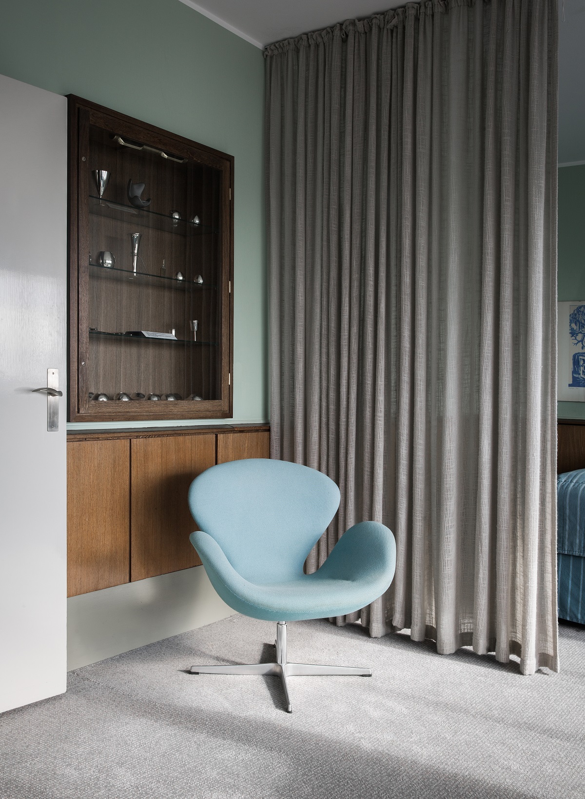 light blue arne jacobsen chair in copenhagen hotel guestroom