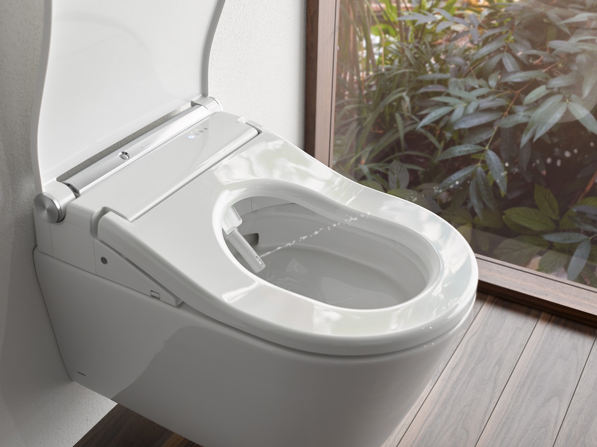 detail of TOTO WASHLET toilet with nozzle and water jet