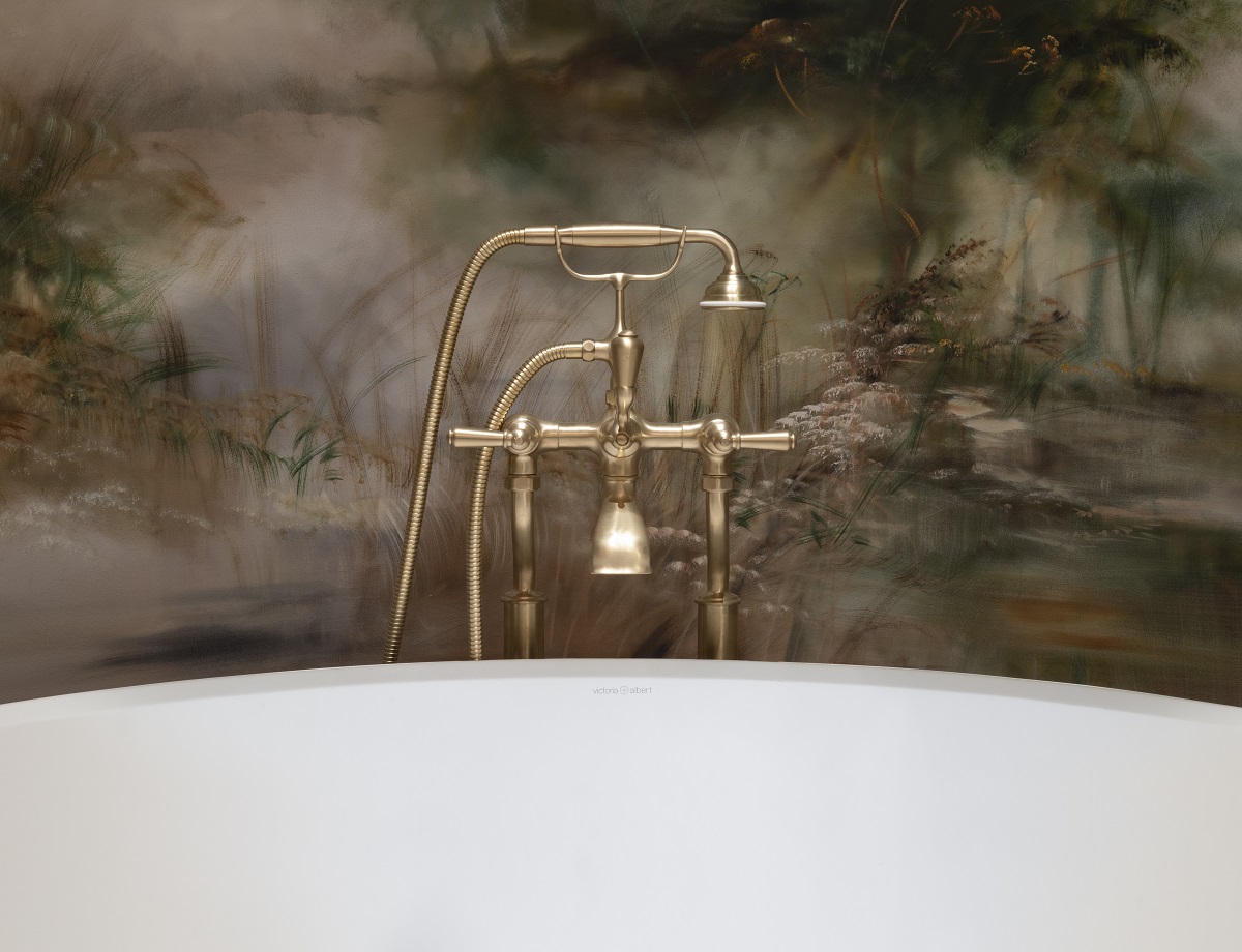 round freestanding bath with brass taps from House of rohl against romantic handpainted mural