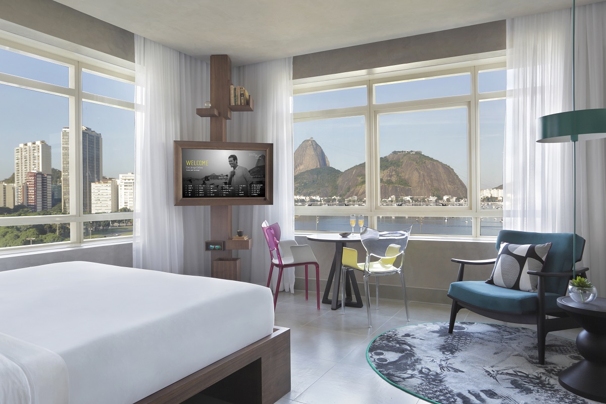 guestroom with dual aspect windows and views over Rio