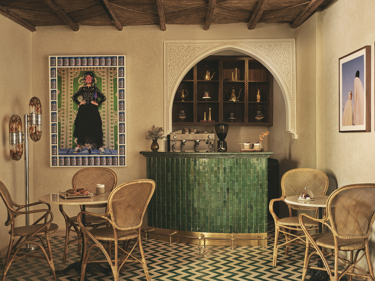 green tiled bar and Hassan Hajjaj art in coffee bar at IZZA