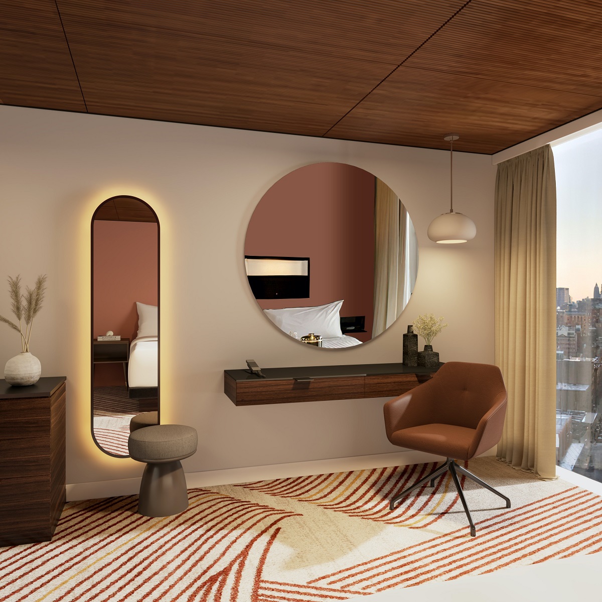 hotel guestroom with round vanity mirror and full length illuminated changing mirror