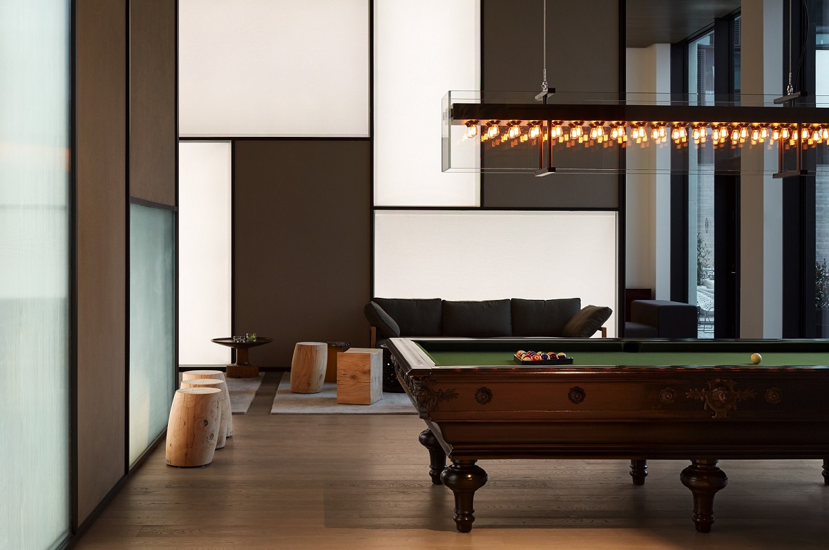 hotel lobby with pool table and minimalist design in Roomers Baden-Baden