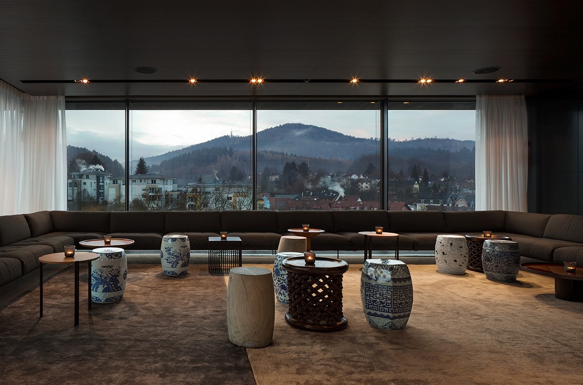 ceramic japanese stools around low tables with view across to Black moutains