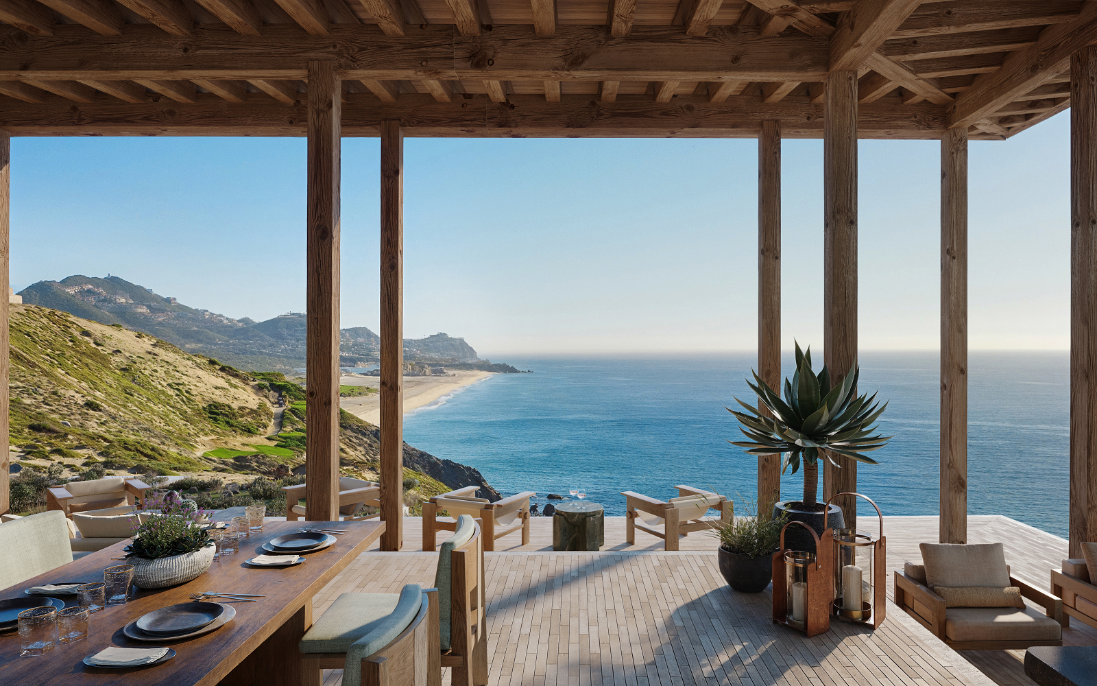 outdoor wooden deck on the edge of a cliff with sea view in Los Cabos