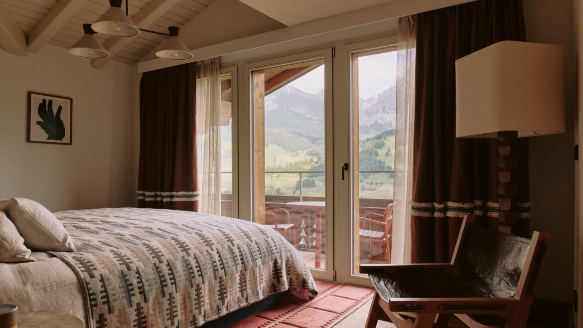 guestroom in The Brecon with views on to the swiss alps from the bed