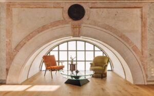 curved stone window detail with chairs and table in the bar at Locke St Joana