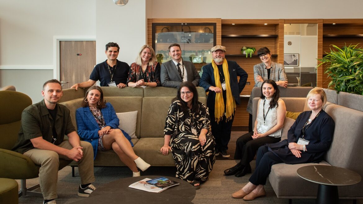 The designers pose with their hosts at Harrods Aviation