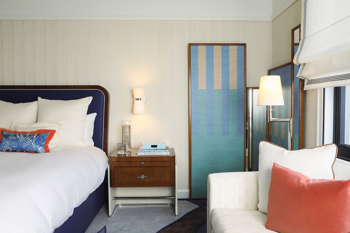 guestroom in Flagler club the Breakers Palm beach with blue and coral accents