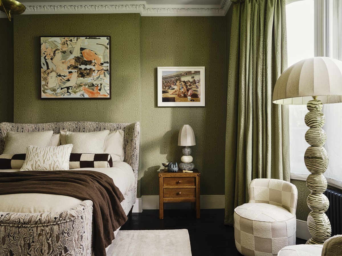 Harlequin fabric and wallcovering in shades of matcha in the bedroom