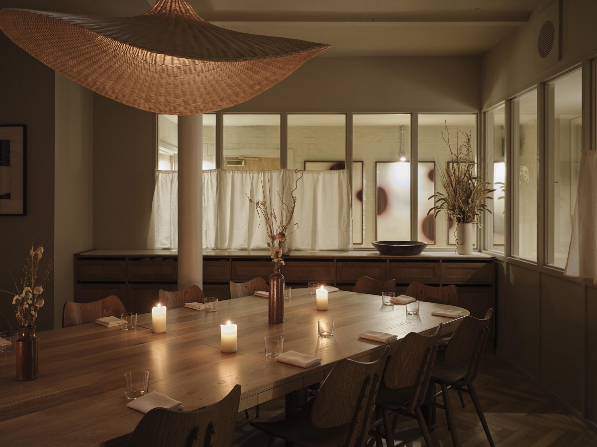 minimal wooden table and restaurant design with candlelight in Morchella