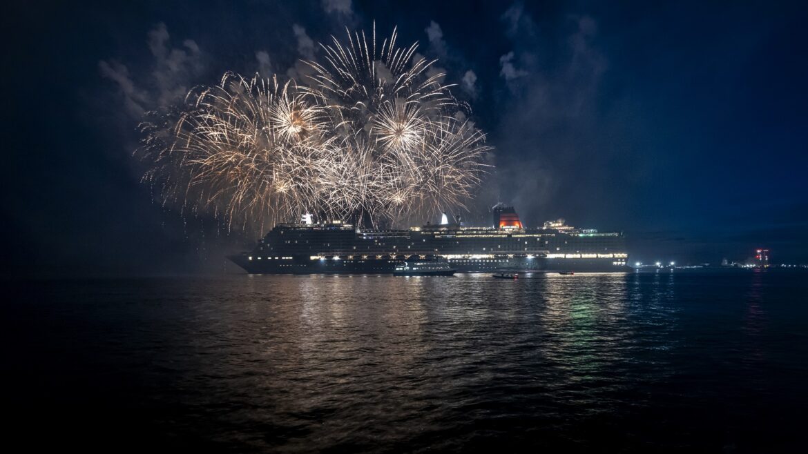 Cunard's Queen Anne ship with fireworks in the background