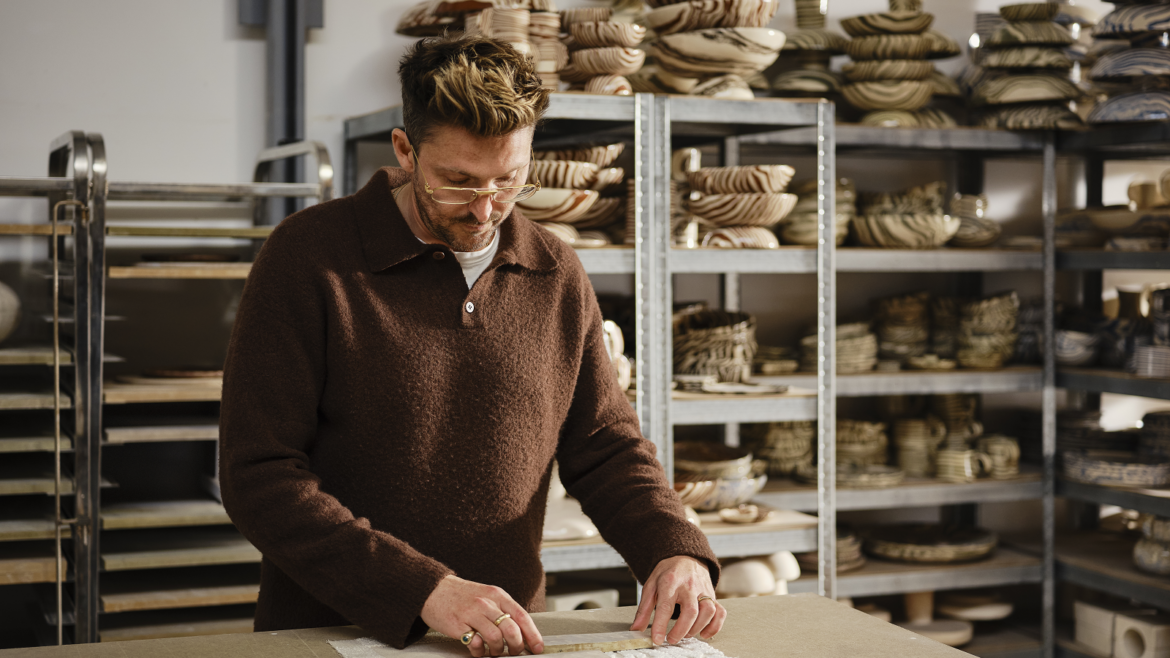 artist Henry Holland in ceramic studio working on Harlequin fabric collection