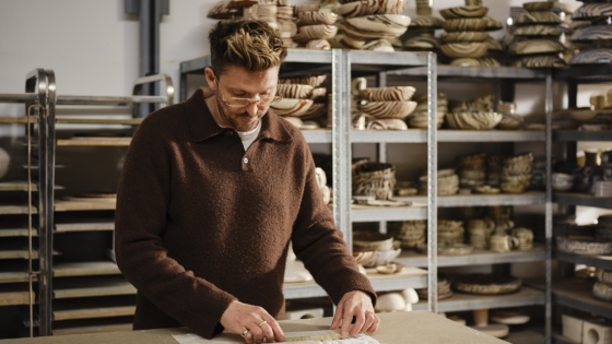 artist Henry Holland in ceramic studio working on Harlequin fabric collection