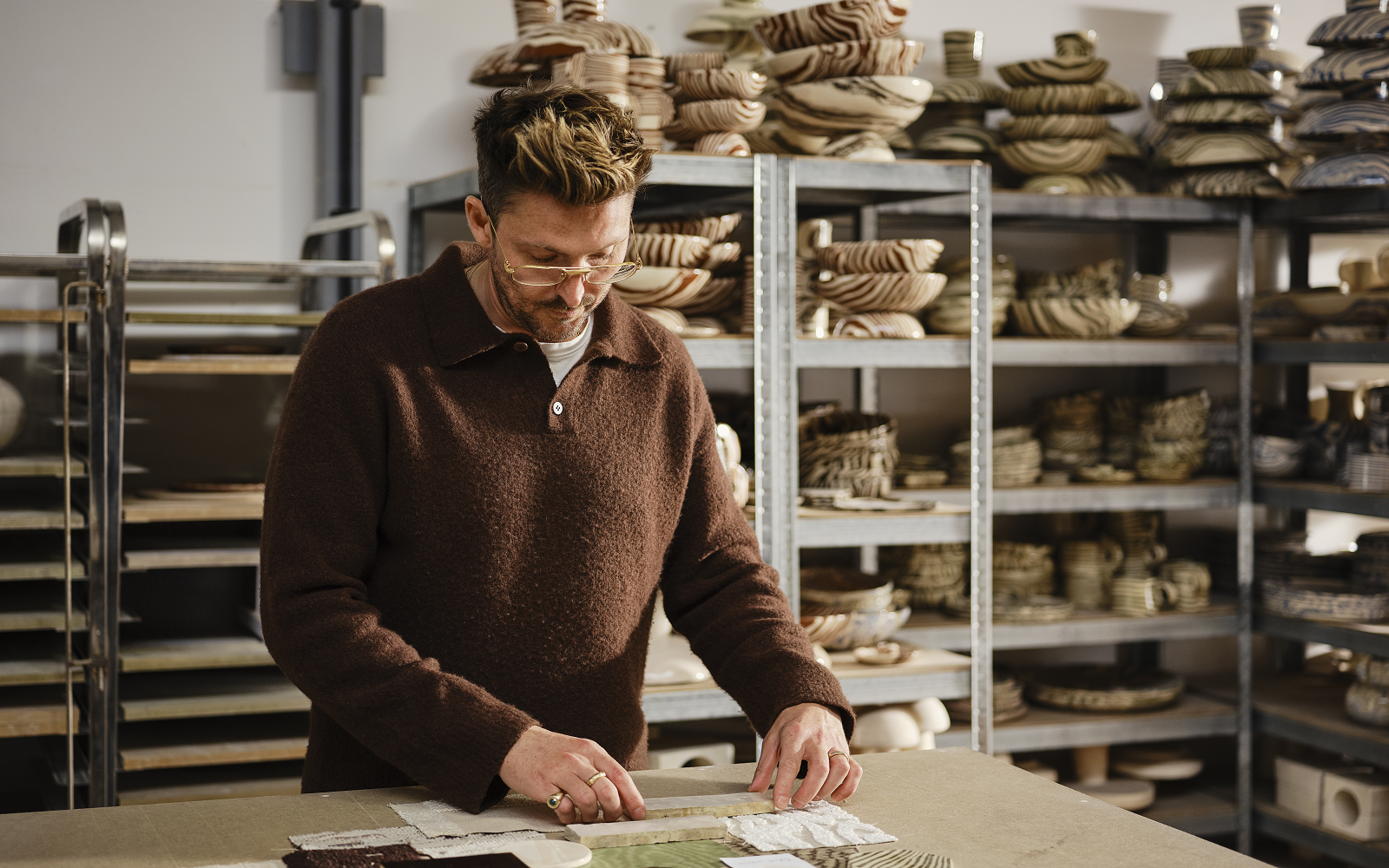 artist Henry Holland in ceramic studio working on Harlequin fabric collection