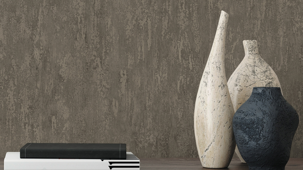 vases and books on a shelf in front of wallcovering from Sekers