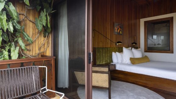 plants and chair on balcony outside guestroom at Hotel Belmar