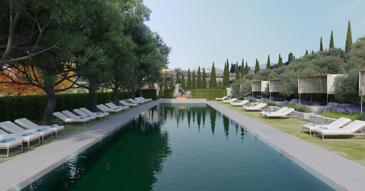 outdoor pool surrounded by Italian landscaped garden and sun loungers