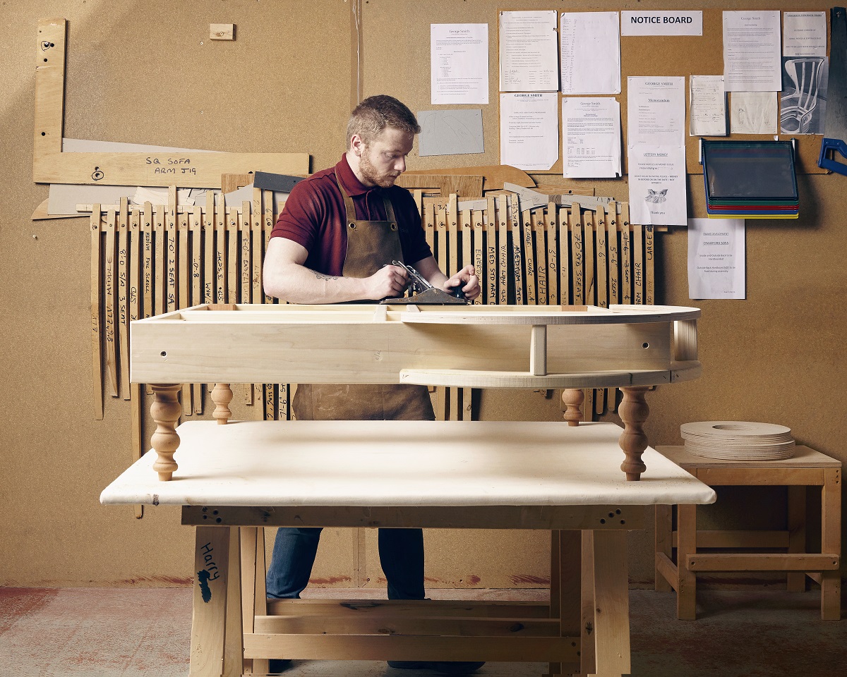 crafting a wooden frame in the George Smith workshop