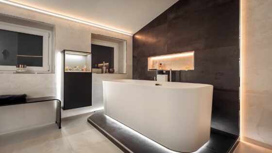 bathroom with built in architectural lighting system from Schluter