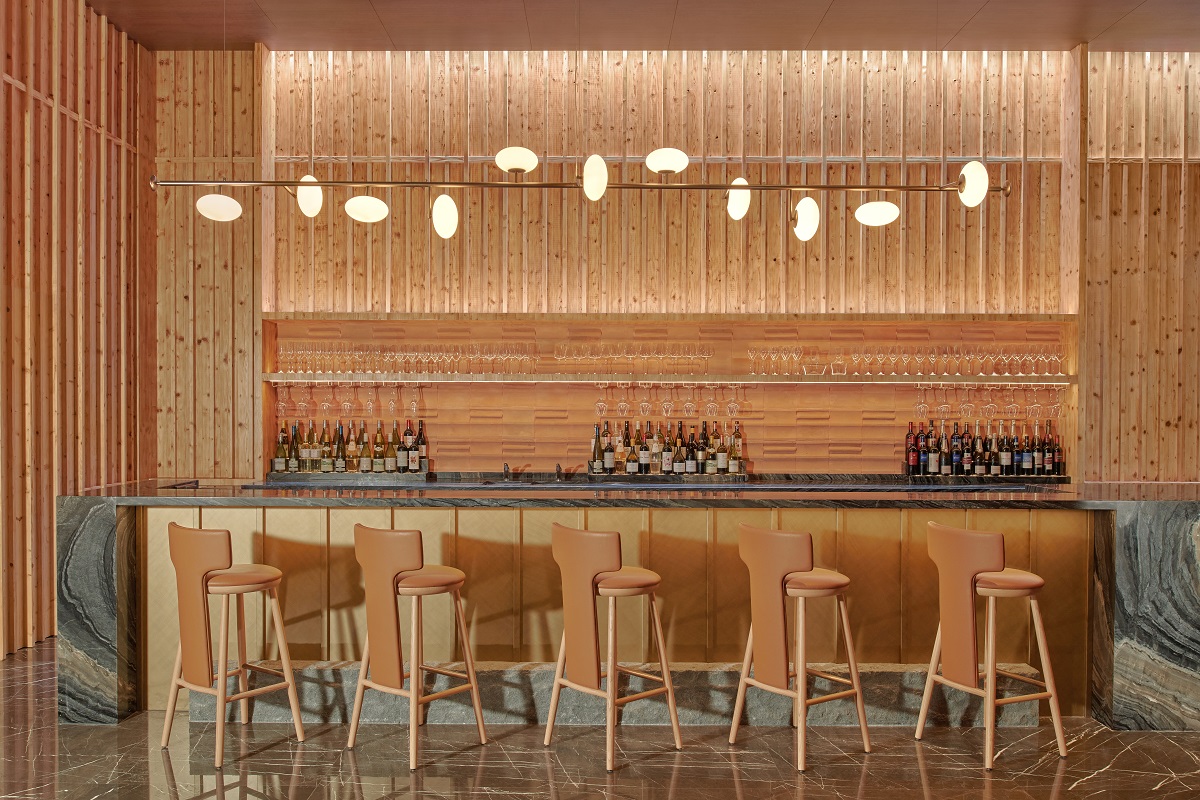 light wood surfaces and furniture in lobby bar Amara Singapore