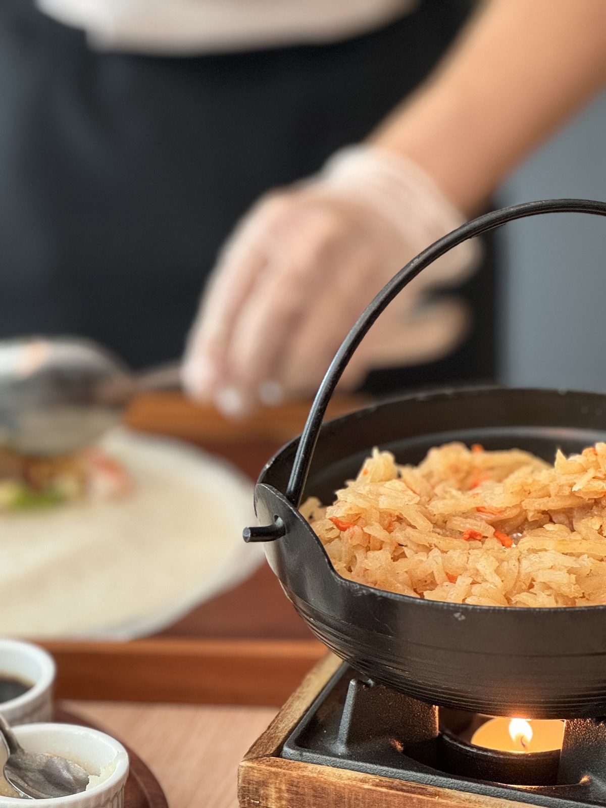 detail of pan and cutlery for nanyang coffee and popiah making