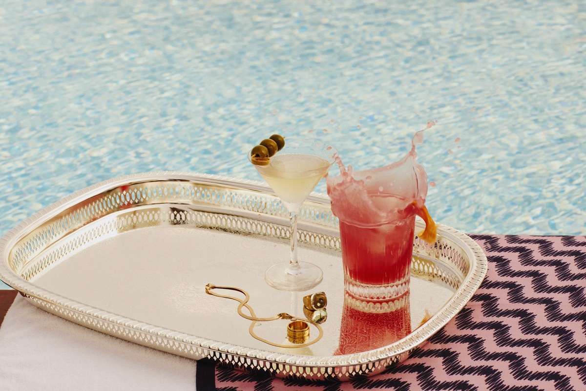 cocktails by the pool on a silver tray