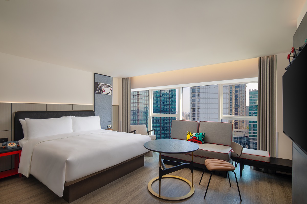 guestroom with view over the city at Moxy Chongqing