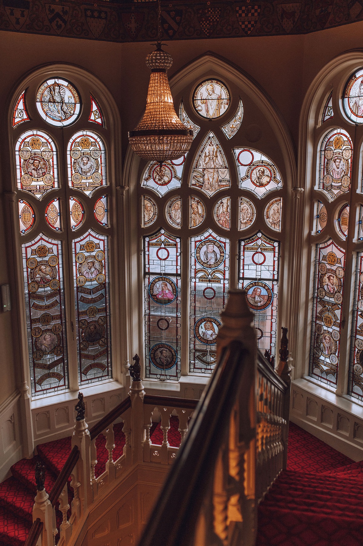 stained glass window and wooden staircase in elvetham Hotel