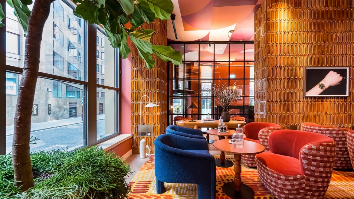 plants, tiled walls and colourful seating in Wilde Liverpool street