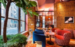 plants, tiled walls and colourful seating in Wilde Liverpool street