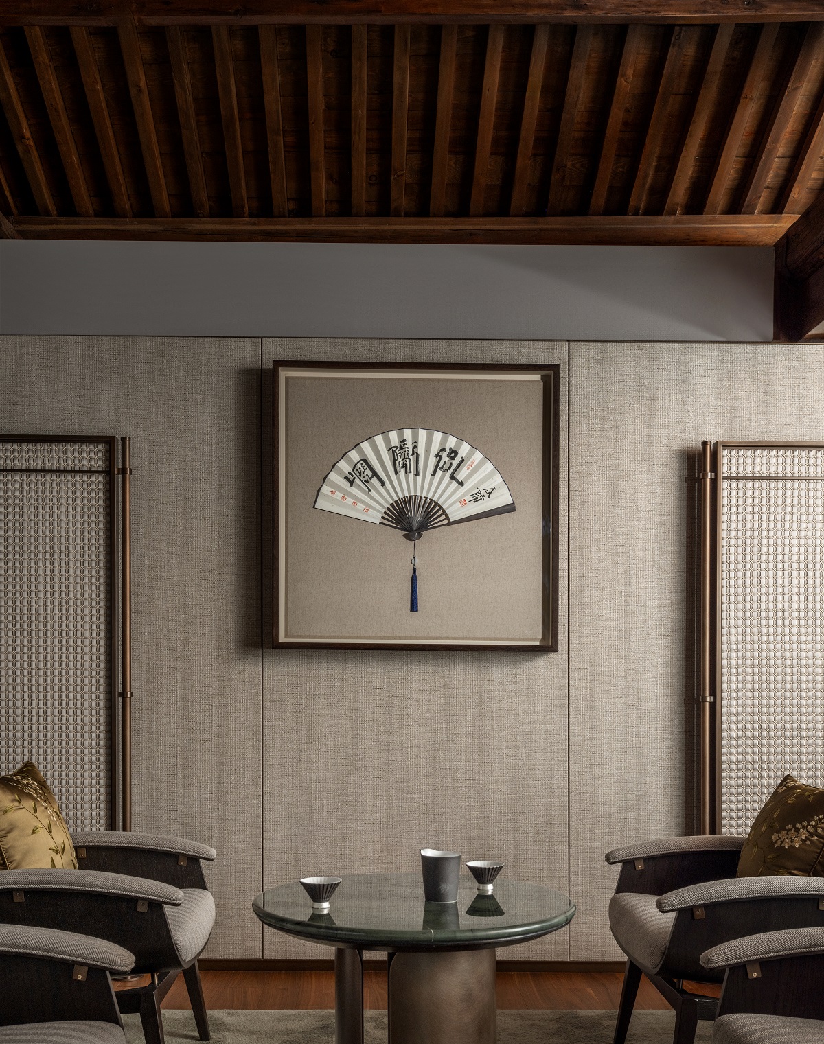 framed Mandarin Oriental fan on hotel wall