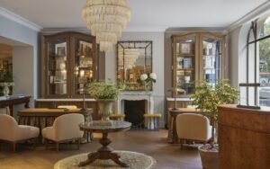 vintage chandelier, mirrors and seating in the hotel lobby Le Grand Hôtel Cayré