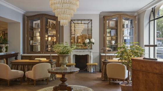 vintage chandelier, mirrors and seating in the hotel lobby Le Grand Hôtel Cayré