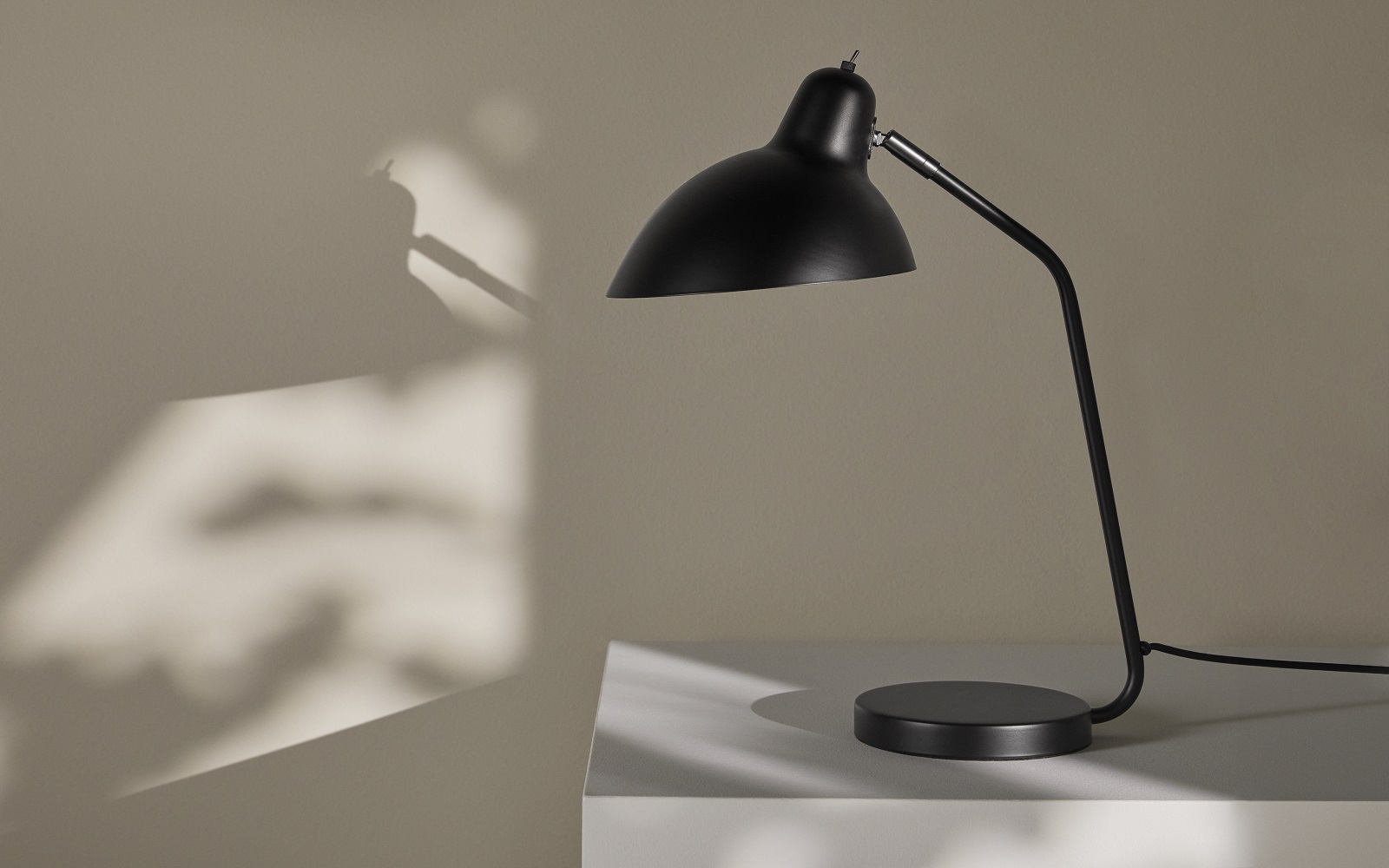 silhouette of anglepoise style table lamp from BoConcept