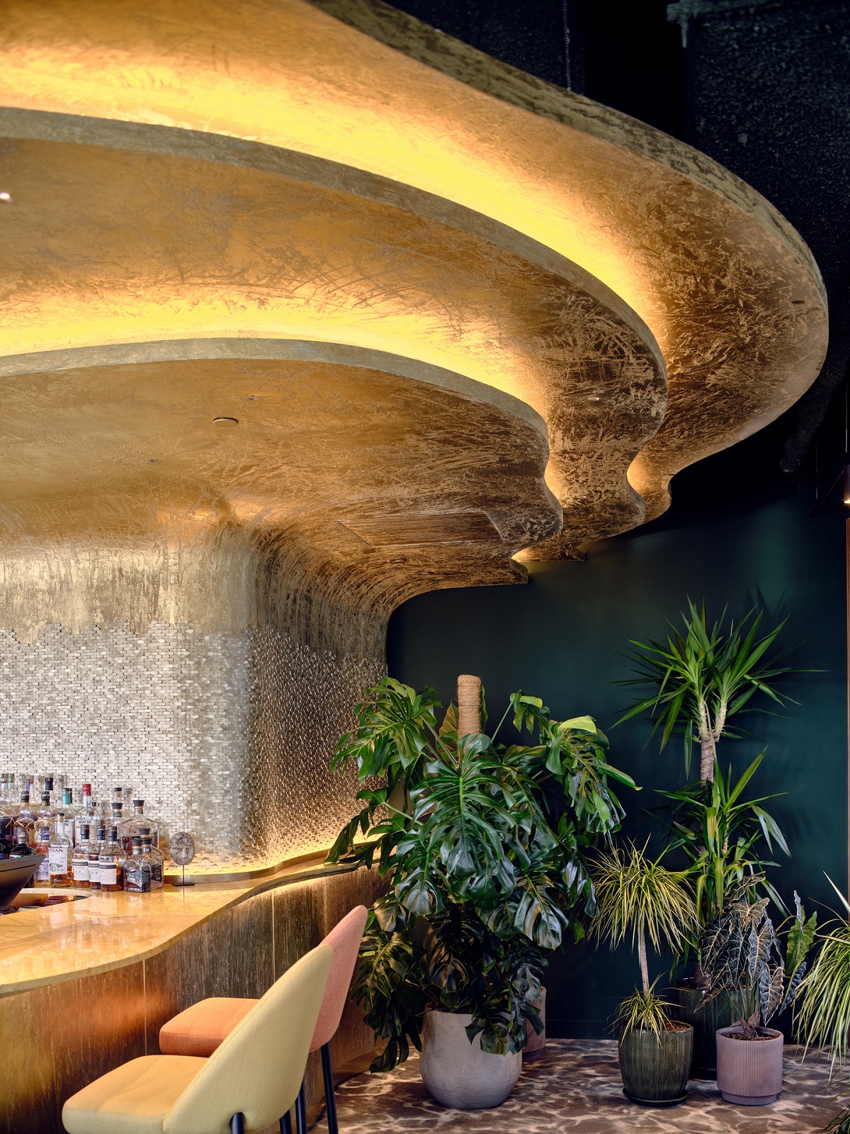 curved gold ceiling detail above the bar in sonora