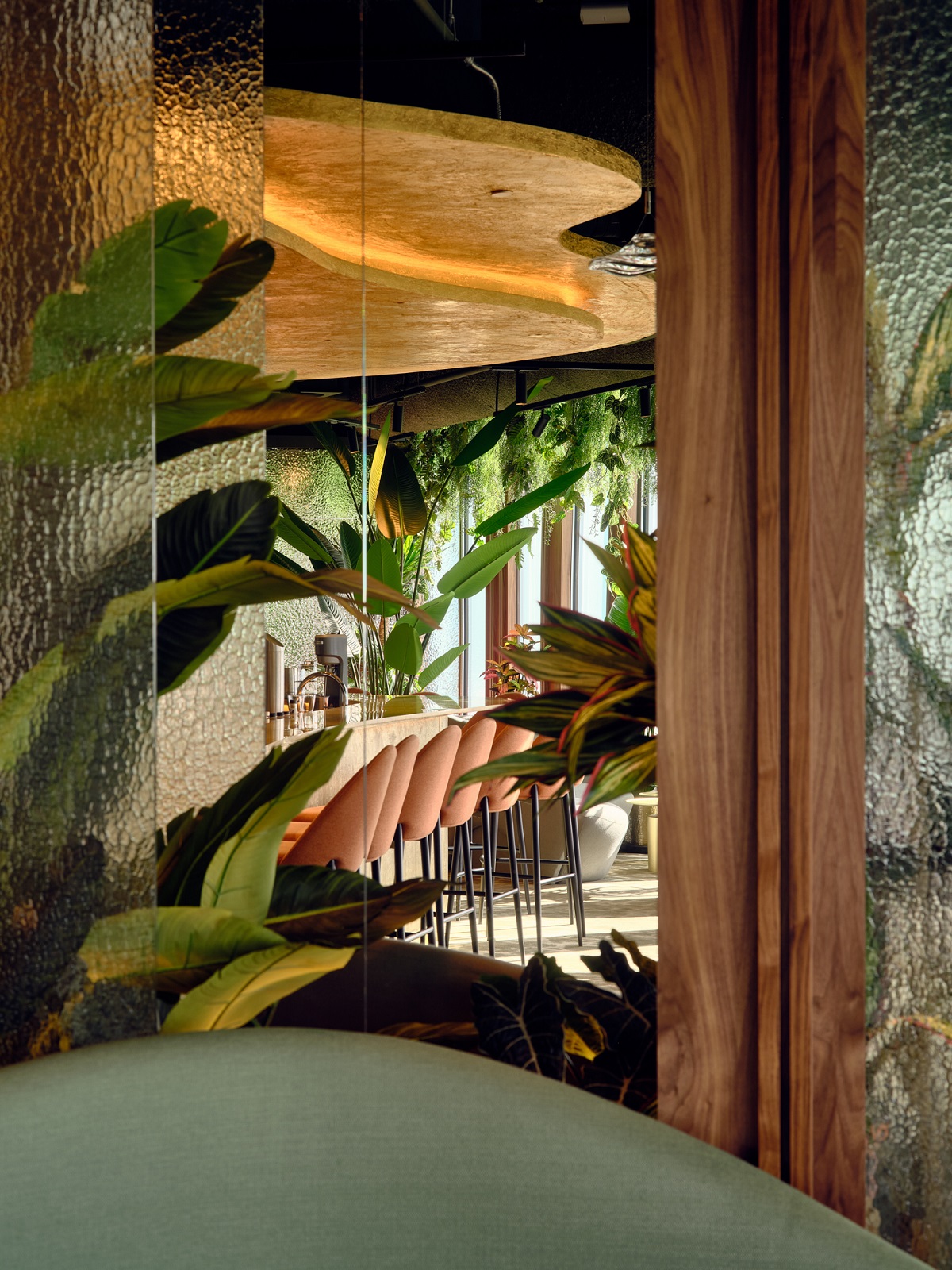 view through glass panels into sonora cocktail bar with curved gold ceiling