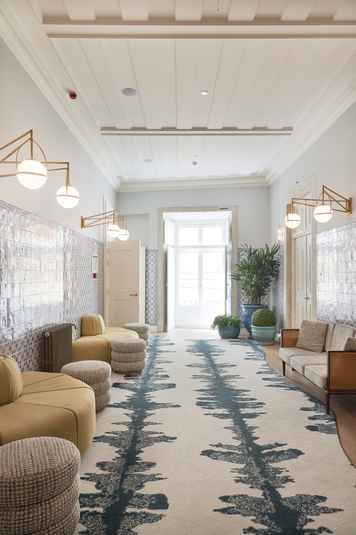 hotel corridor with cream and blue patterned bespoke carpet