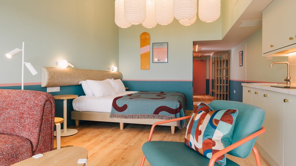 turquoise and brown mid century inspired aparthotel guestroom SeaSpace