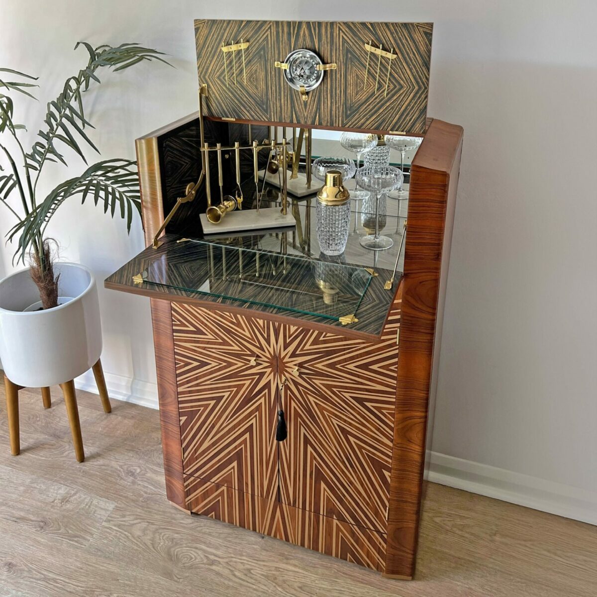 Walnut cocktail cabinet covered with Newmor Savoy Starbursty wallpaper