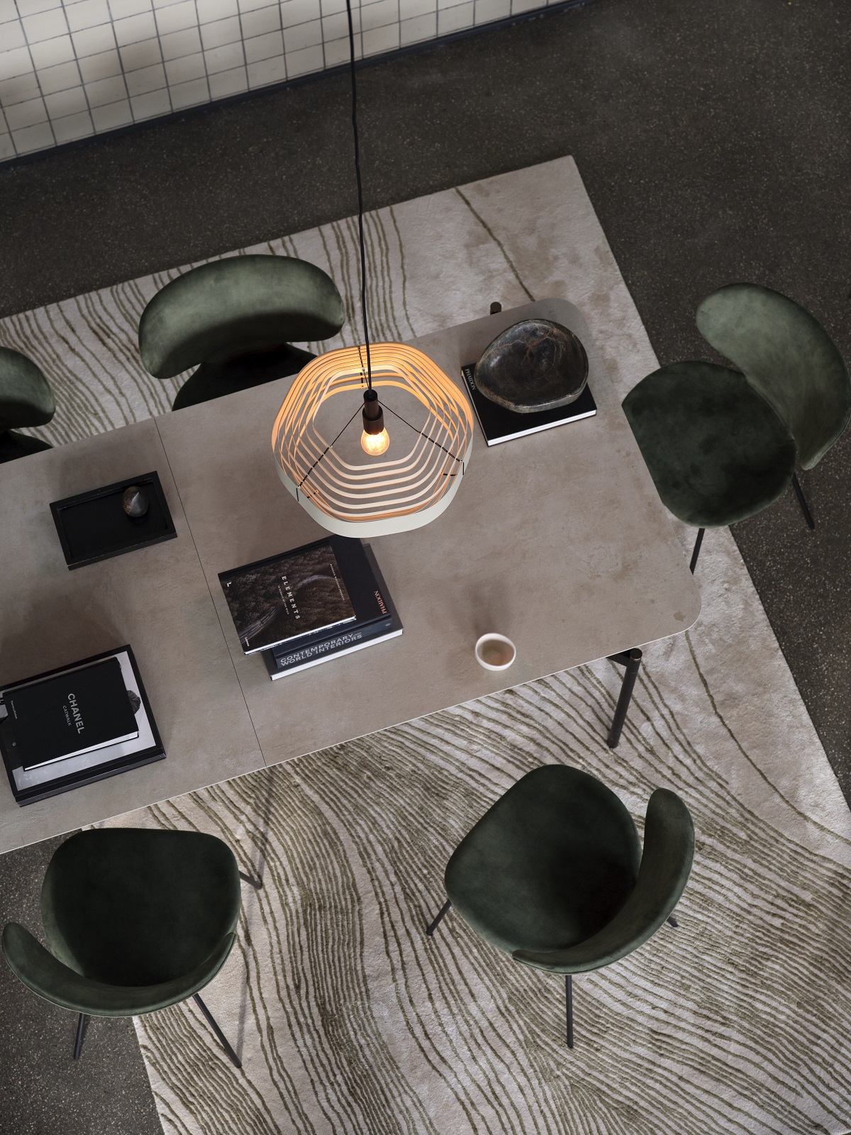 aerial view of BoConcept pendant light above table with black chairs